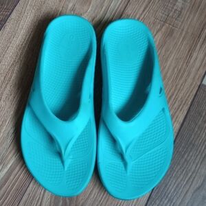 Teal Oofos Flip Flops